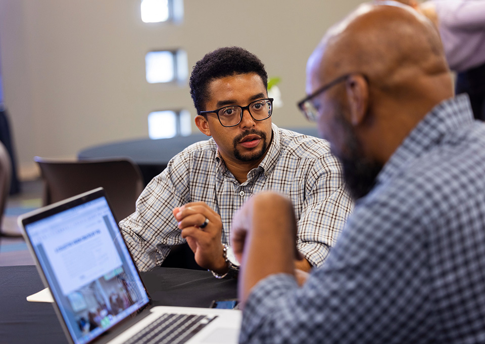 Student talks with advisor