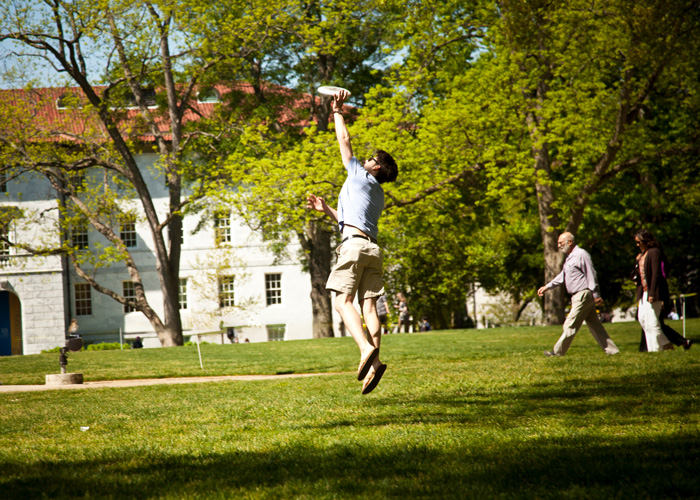 Student catching a frisbee