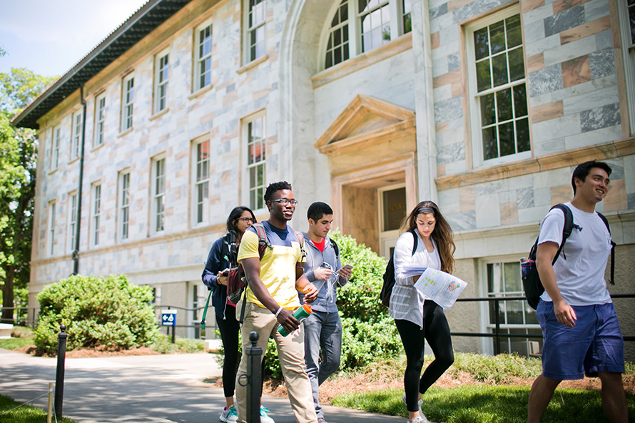 Students walking through ALT campus quad